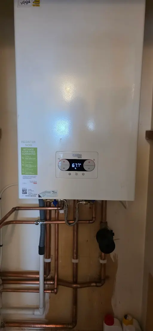 Completed Vokera boiler installation with copper pipework